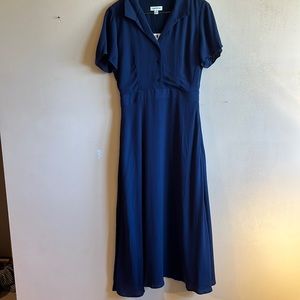 Maxi dress with cinched waist and flowy skirt